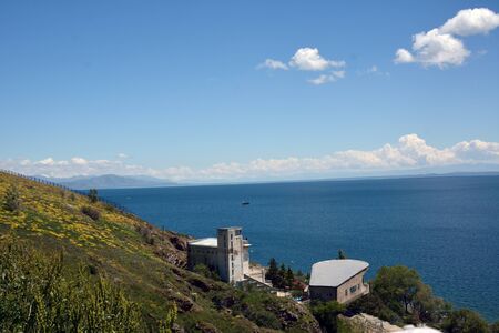 Sevan lake with nearby houses and hills, Armenia
