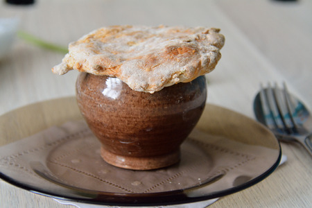 Pot pie served in a pot for dinnerの写真素材
