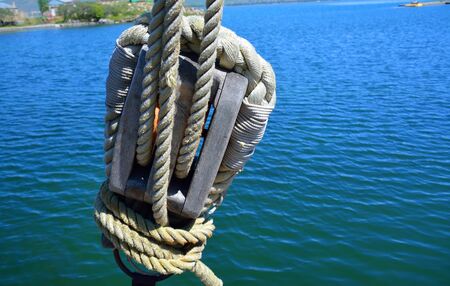 Big old block with ropes on the ship