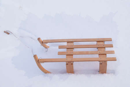 Sledge in snow in frosty frame on the edgesの写真素材