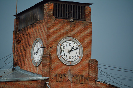 brick tower with the clock in Serpukhov, Russiaの写真素材