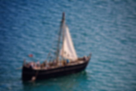 wooden ship with people, blurredの写真素材