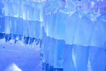 cubes with ice, illiminated with blueの写真素材