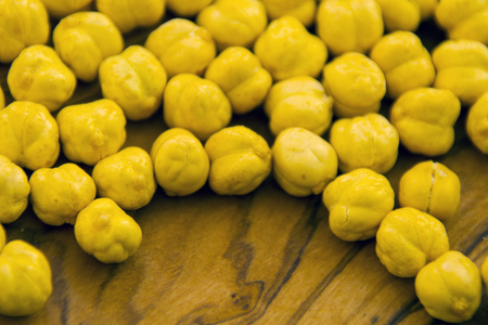 yellow roasted chick-peas on the wooden backgroundの写真素材