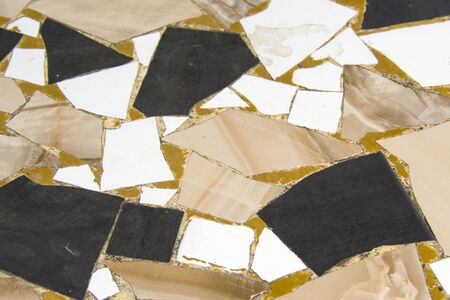 detail of the floor with mosaics in small pieces