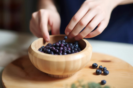 Hand blueberry plate at wooden board. Gardening vitamin. Generate Aiの素材