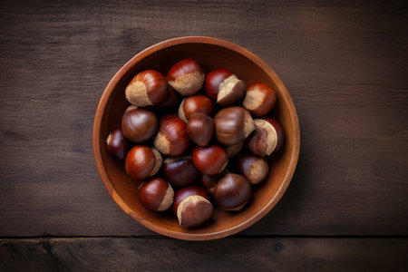 Horse chestnuts wooden table top view. Tasty rustic nut plant organic. Generate Aiの素材