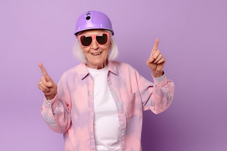 Positive grandmother with sunglasses. Joyful and smiling women with purple helmet. Generate AIの素材