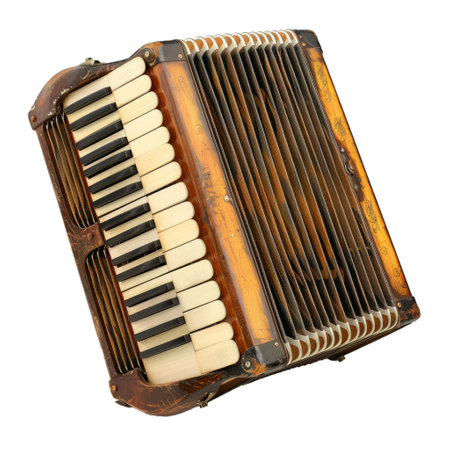 Antique accordion with a wooden body and keys, showing signs of age and use, lying on its sideの素材
