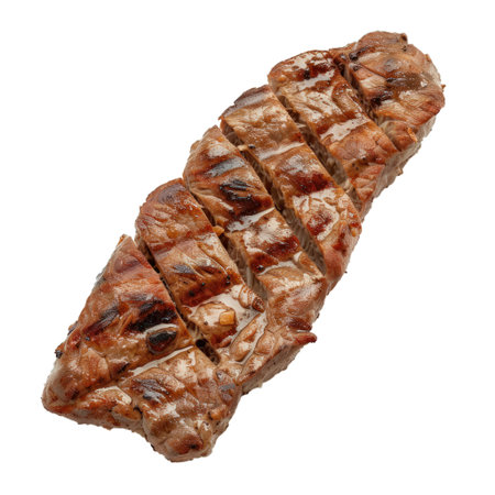 Juicy grilled and sliced pork tenderloin steak with stripes from a grill isolated on white backgroundの素材