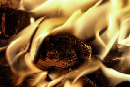 Fire. Burning charcoal in the grill.