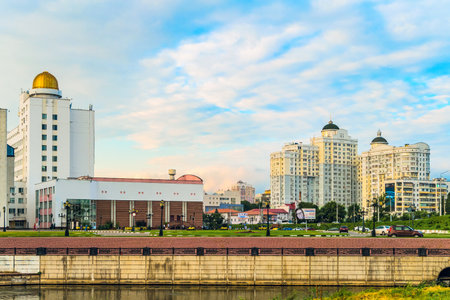 BELGOROD, RUSSIA - JULY 04, 2016: City embankment of the river Vezelka. Campus of the Belgorod State University. Detail of the main building of university with observatory and residential complex "Slavic".のeditorial素材