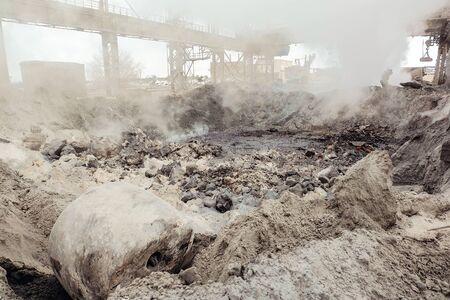 Hot slag dump in metallurgical industry. Heavy industry plant shop.の写真素材