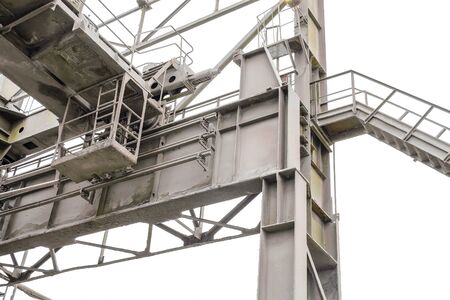 Last row steel column and crane beam with deadlock stop. Brake disconnecting rail on the overhead...