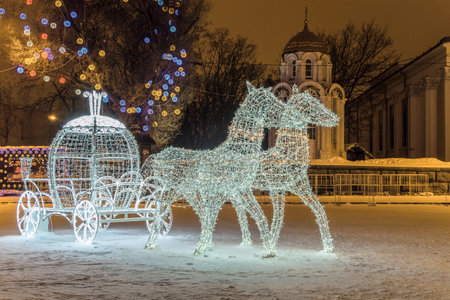 Belgorod, Russia - January 8, 2017:  LED light horses with a carriage decoration composition in New Year's Cathedral Square Belgorod city.のeditorial素材