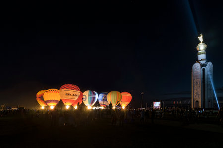 Prokhorovka, Belgorod region, Russia -August 06, 2017: Festive night glow of balloons near the belfry at the memorial complexのeditorial素材