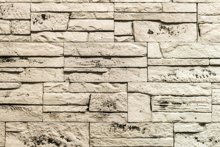Gypsum facing tile on the wall. Construction material.の写真素材