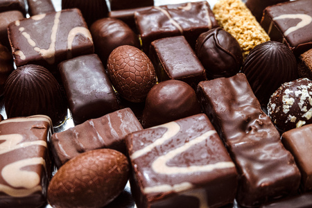 Ð¡hocolate candy set. Lots of various sweet candies. Limited depth of field.の写真素材