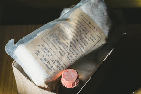 Belgorod region, Russia - August 19, 2019: Individual anti-chemical package with instructions for first aid in case of injury by toxic substances. Produced in the Soviet Union 1986.のeditorial素材