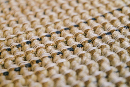 Surface of jute carpet backing surface with selective focus and limited depth of field. Jute - natural textile fiber.の写真素材