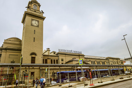 Moscow, Russia - June 11, 2021: Kievsky railway station building and bus stop in Moscow. Monument of architecture and engineering art. Building was built in 1914-1918.のeditorial素材