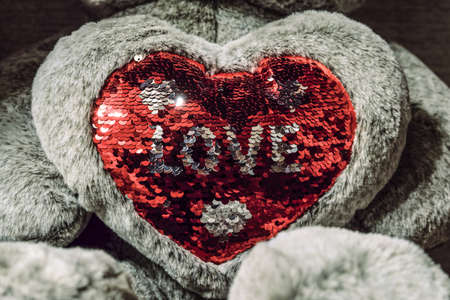 Soft toy red heart with embroidered double-sided sequins word - loveの写真素材