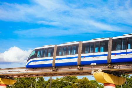 Electric monorail passenger train on the flyover. Modern public transport in Russian Moscow.の写真素材