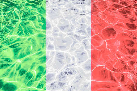 Italian flag with abstract neon light water effectの写真素材