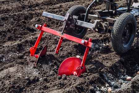 Mounted disc hiller for small farm tractor. Potato seeds planting.の写真素材