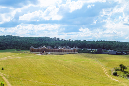Lipetsk region, Russia - July 14, 2022: General view of the Kudykina Gora park from archaeological natural monument hill fort (ancient settlement mound Kurgan Kamenskoe). wooden castle.のeditorial素材