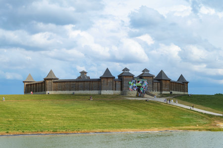 Lipetsk region, Russia - July 14, 2022: Fairy wooden ancient russian fortress on green hill....