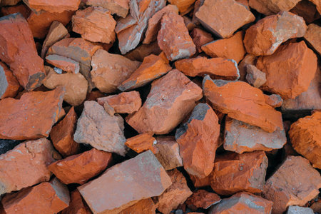 Stones made from broken red bricks close upの写真素材