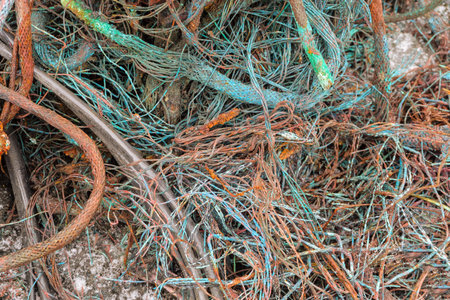 Burnt copper wires. Non-ferrous scrap metal. Copper oxide on metal surfaces.の写真素材