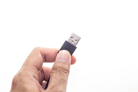USB cable isolated with hand