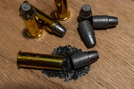 macro photo of a disassembled handgun cartridgeの写真素材