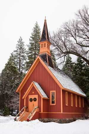Winter scene with the chapel at Yosemite Valley, California.の写真素材