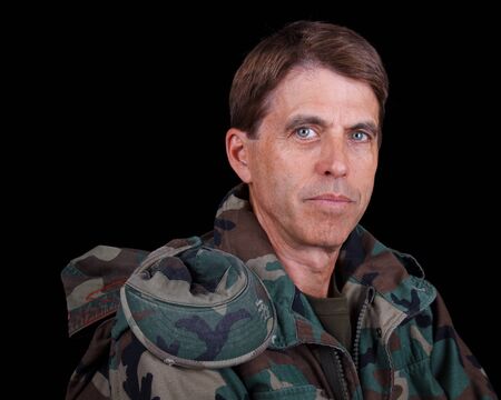 Closeup portrait of a middle aged army veteran at rest.の写真素材