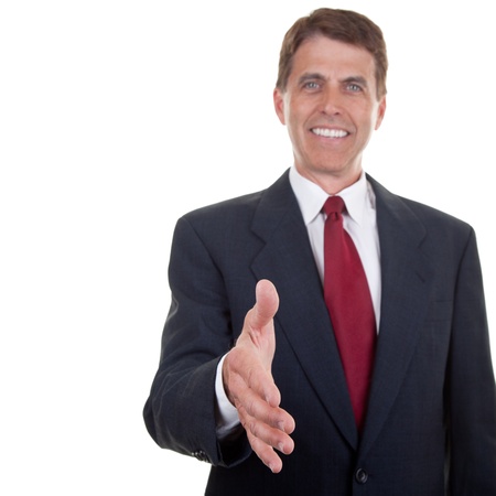 Selective focus on the extended hand of an elegant business man.の写真素材