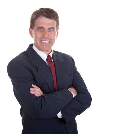 Handsome man in a business suit smiling and looking at the viewer.の写真素材