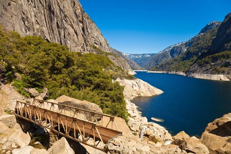 Wooden bridge at Hetch Hetchy reservoir in Yosemite National Park, California.の写真素材