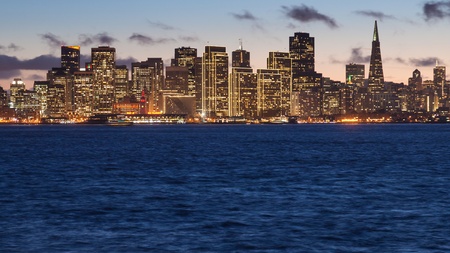 San Francisco skyline at sunset, seen from Treasure Islandの写真素材
