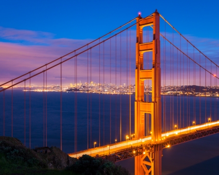 North tower of the Golden Gate Bridge with San Francisco across the bay の写真素材
