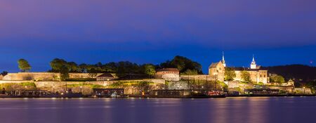Akershus fortress and castle panorama at night in Oslo, Norway.のeditorial素材
