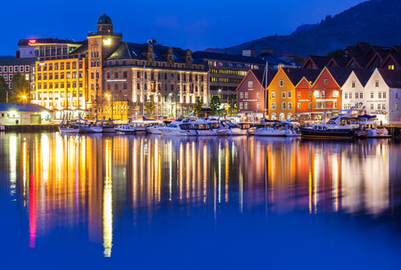 The Bryggen Hanseatic Wharf across the fjord at night, a UNESCO World Heritage site in Bergen, Norway.のeditorial素材