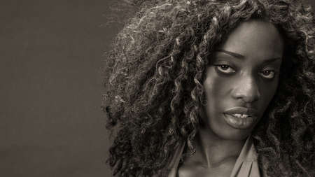 Portrait of a scared or depressed black girl.