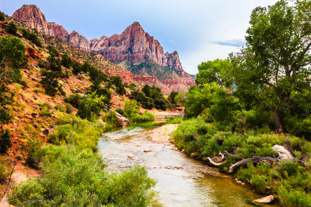 The Watchman and the Virgin river at sunset in Zion Canyon National Park, Utahの写真素材