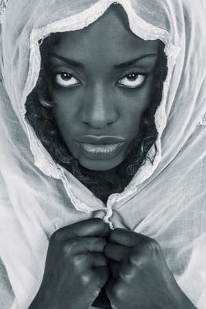 Pretty African woman with a scarfの写真素材