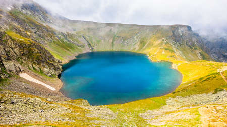The Eye lake, one of the Seven Rila Lakes in the Rila Mountains, Bulgariaの写真素材
