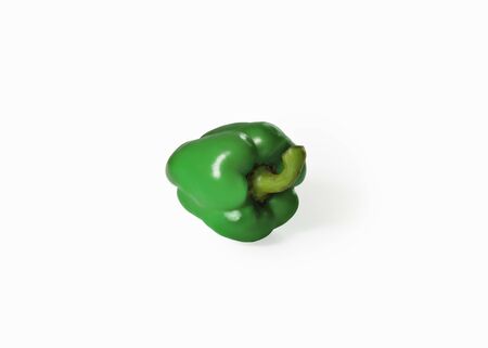 One green bell pepper isolated on a white backgroundの写真素材