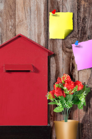 Mailbox Post, with flower, paper notes, art, background, wood, の写真素材